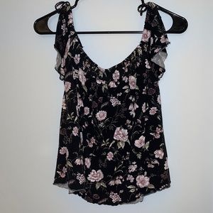 Black off-the-shoulder blouse with light purple flowers from American Eagle